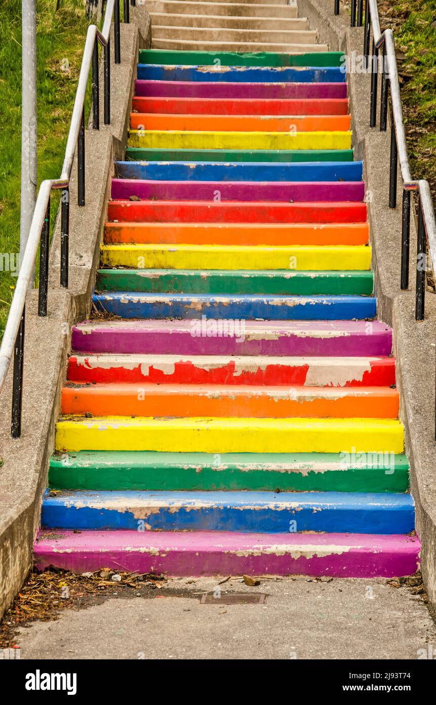 Borgarnes,Iceland, May 7, 2022: concrete staircase with the rainbow colors of the lgbti community in somewhat faded paint Stock Photo