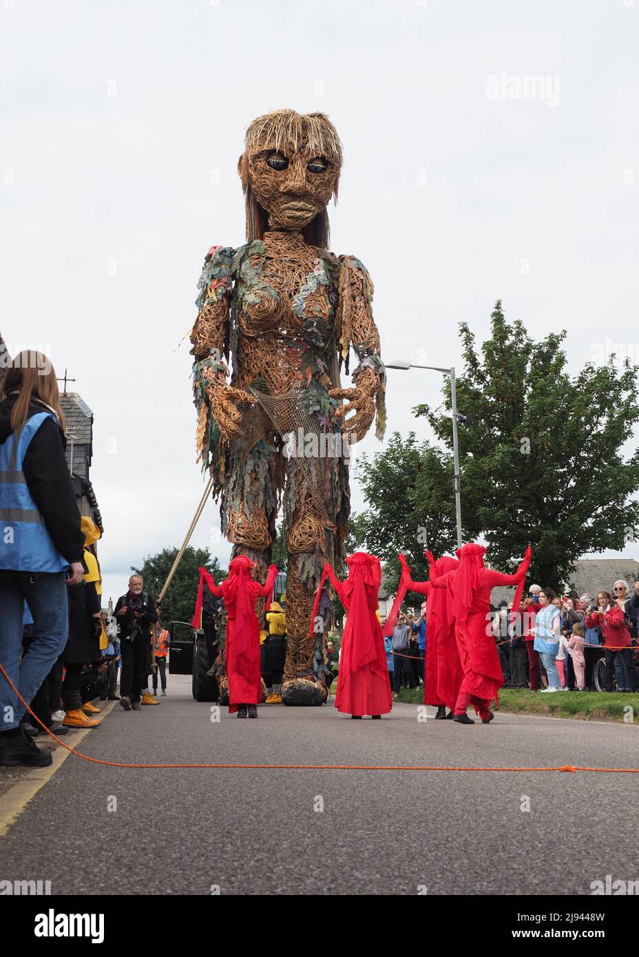 Storm, the mythical sea goddess meeting the red spirits amongst the people near Nairn Links on an overcast day. Stock Photo