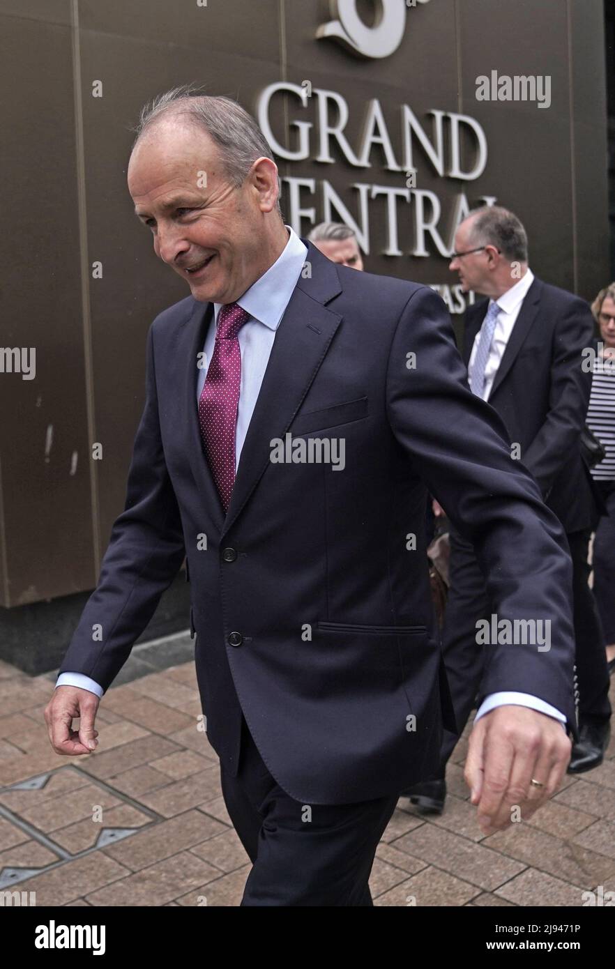Taoiseach Micheal Martin leaves the Grand Central Hotel, during a visit to Belfast for NI protocol talks with Stormont leaders and meet business representatives. Picture date: Friday May 20, 2022. Stock Photo