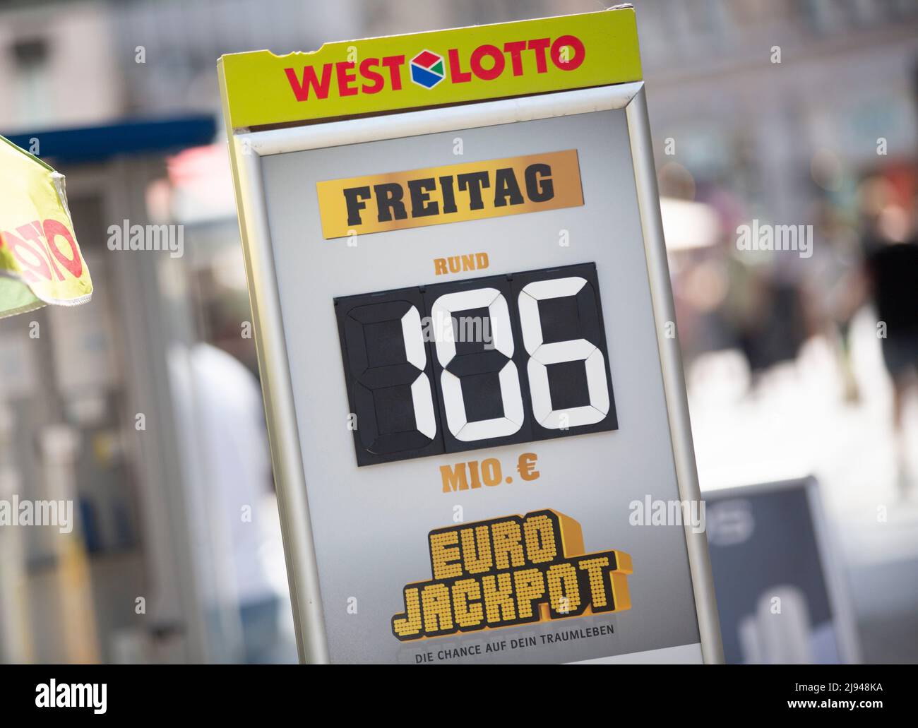 Cologne, Germany. 20th May, 2022. 106 million euros in the Eurojackpot is  written on a board in front of a lottery retailer. Eurojackpot win record  possible - more than 100 million euros
