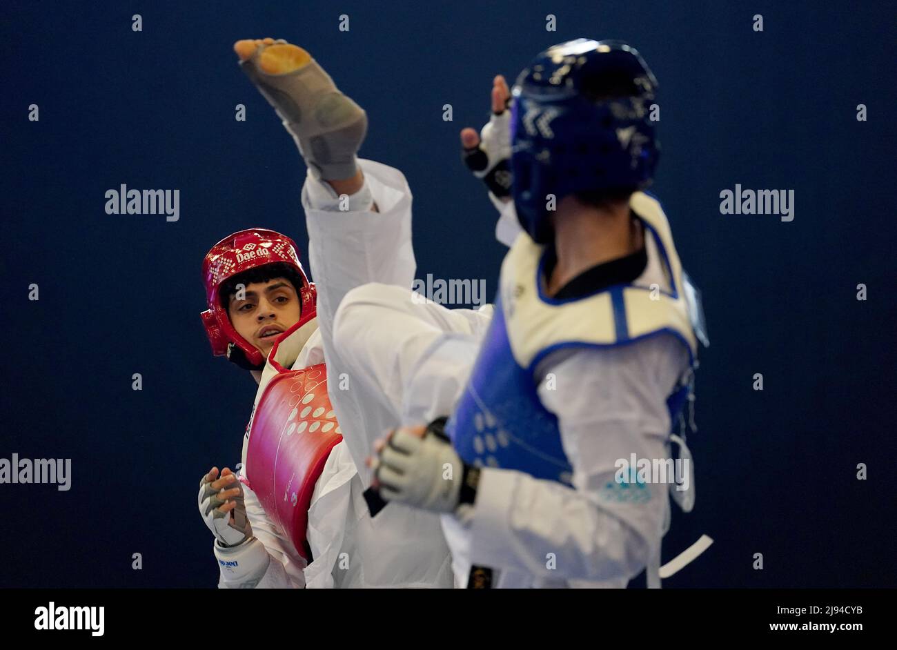 Great Britain's Mohammed Nour (left) on his way to winning his Round
