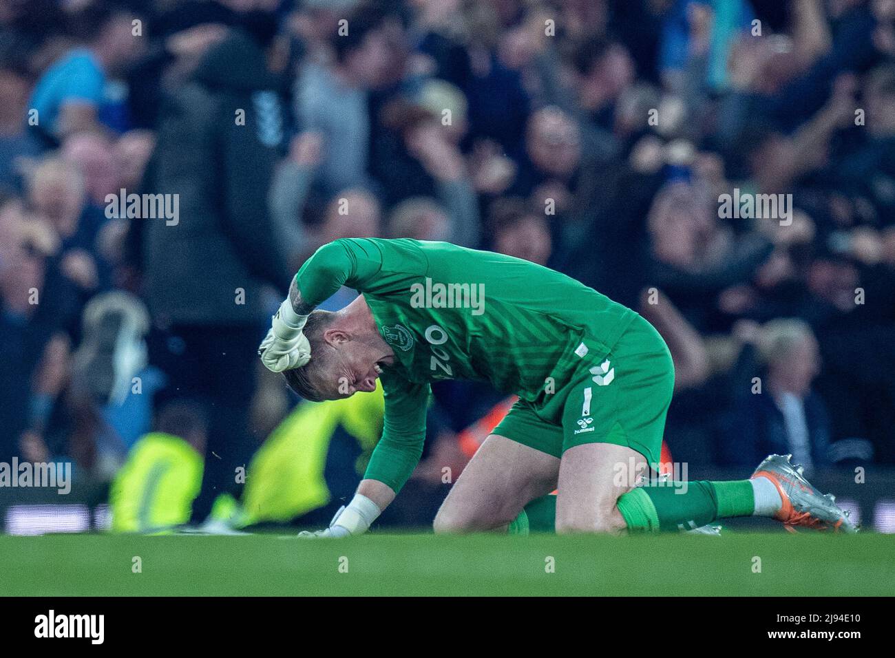 LIVERPOOL, ENGLAND - MAY 19: Jordan Pickford of Everton celebrates after his team score 3rd goal during the Premier League match between Everton and Crystal Palace at Goodison Park on May 19, 2022 in Liverpool, United Kingdom. (Photo by Sebastian Frej) Stock Photo