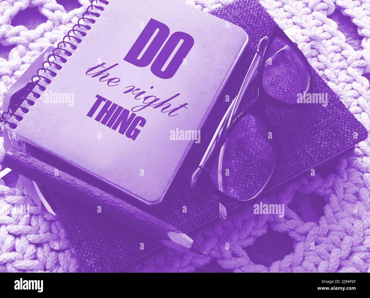 text-do-the-right-things-words-on-the-cover-of-notebook-eyeglasses