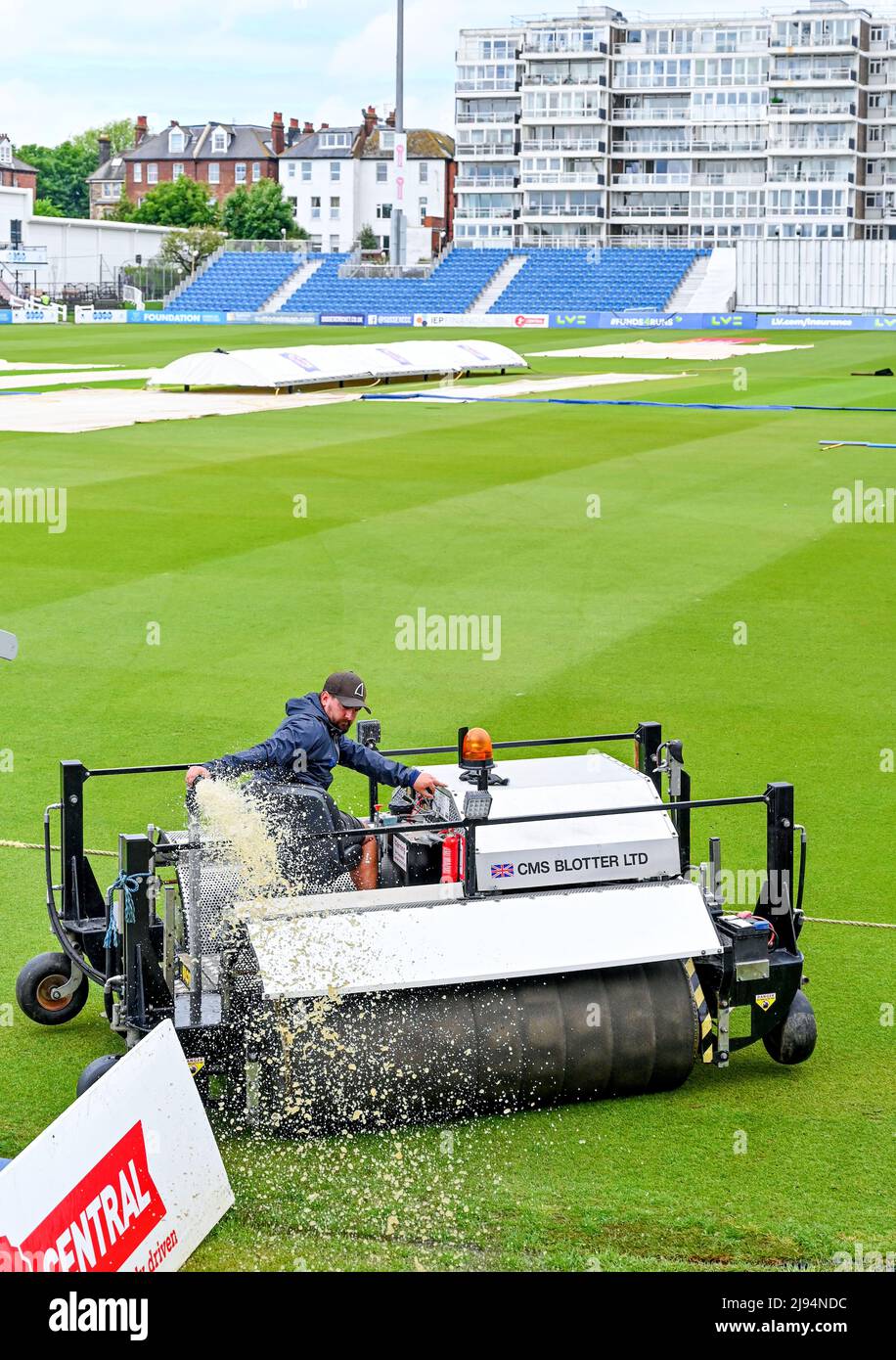 Hove UK 20th May 2022 -  Water is pumped off the wet outfield on the first day of the cricket tour match between Sussex and New Zealand at the 1st Central County Ground Hove . : Credit Simon Dack / Alamy Live News Stock Photo