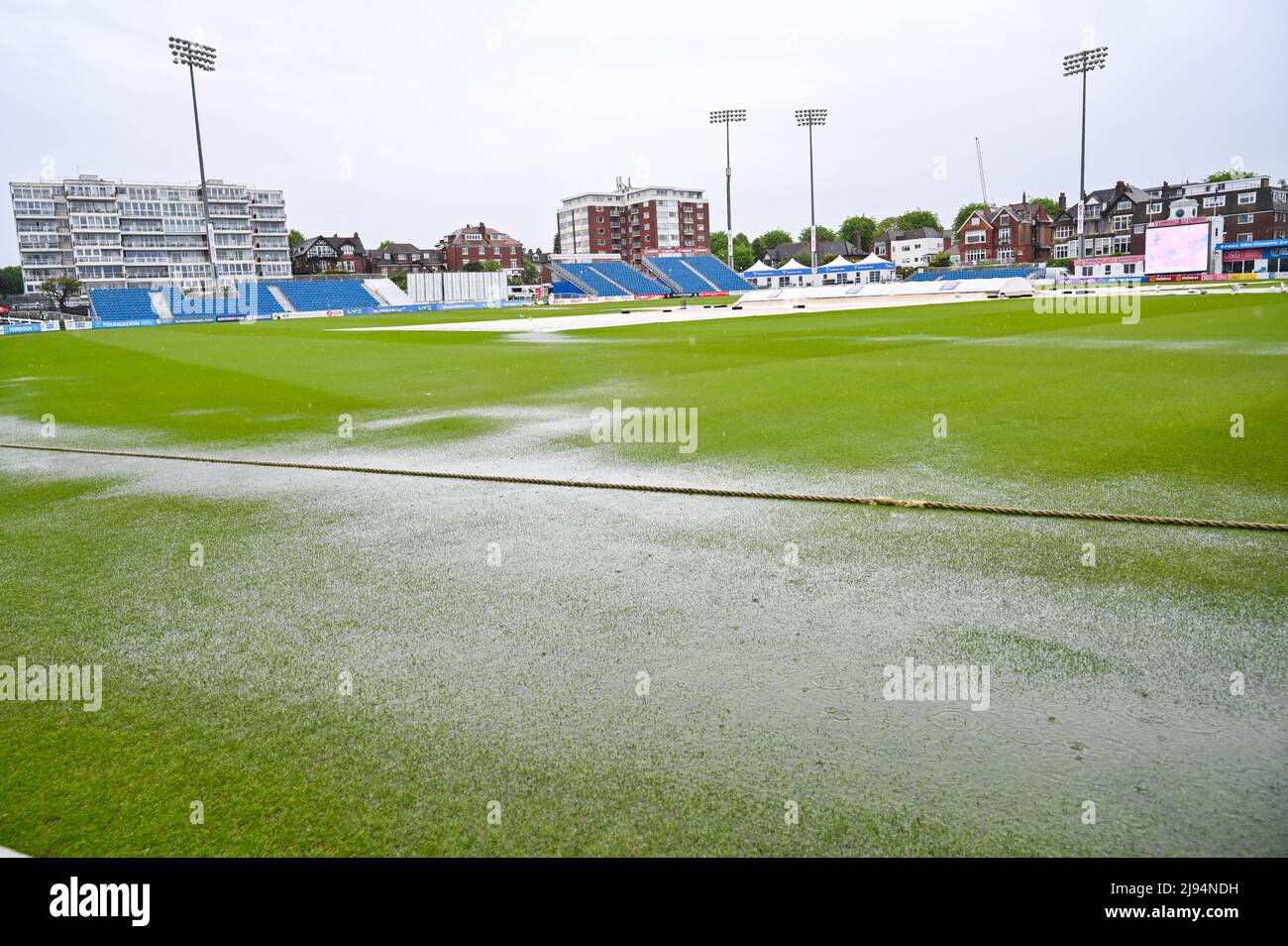 Hove UK 20th May 2022 -  The wet outfield on the first day of the cricket tour match between Sussex and New Zealand at the 1st Central County Ground Hove . : Credit Simon Dack / Alamy Live News Stock Photo