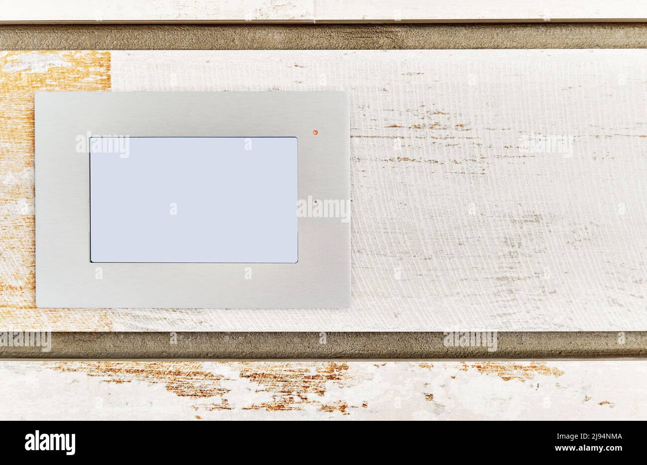 Close-up view white smart home automation system on wooden background with copy space backdrop. Modern tech, comfort living concept Stock Photo