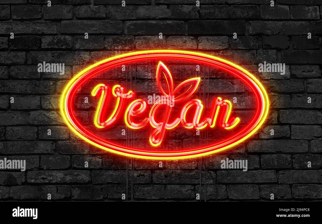 Vegan Neon Sign on a dark brick background Stock Photo Alamy