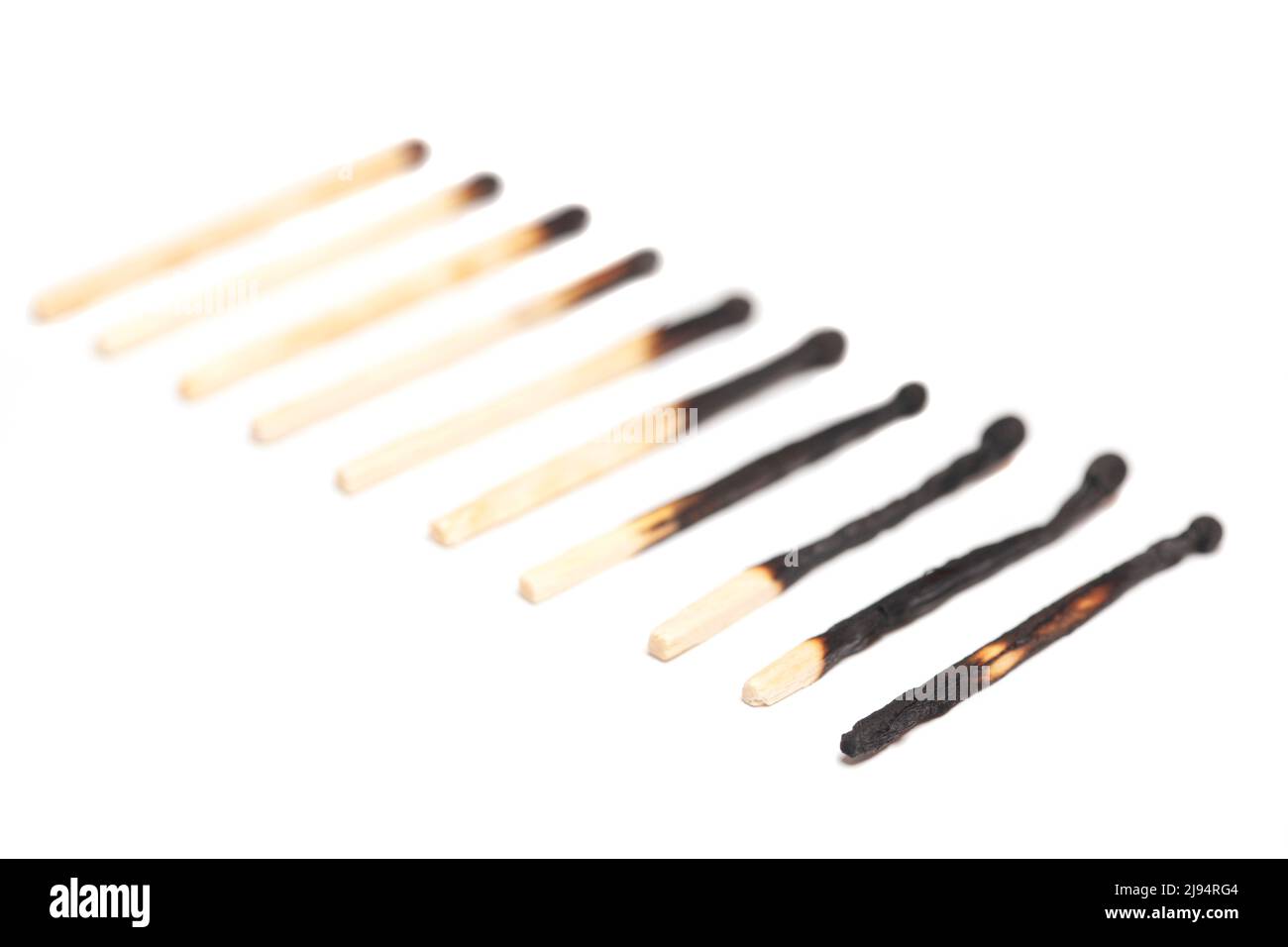 Different stages of match burning. Burnt matches isolated on white