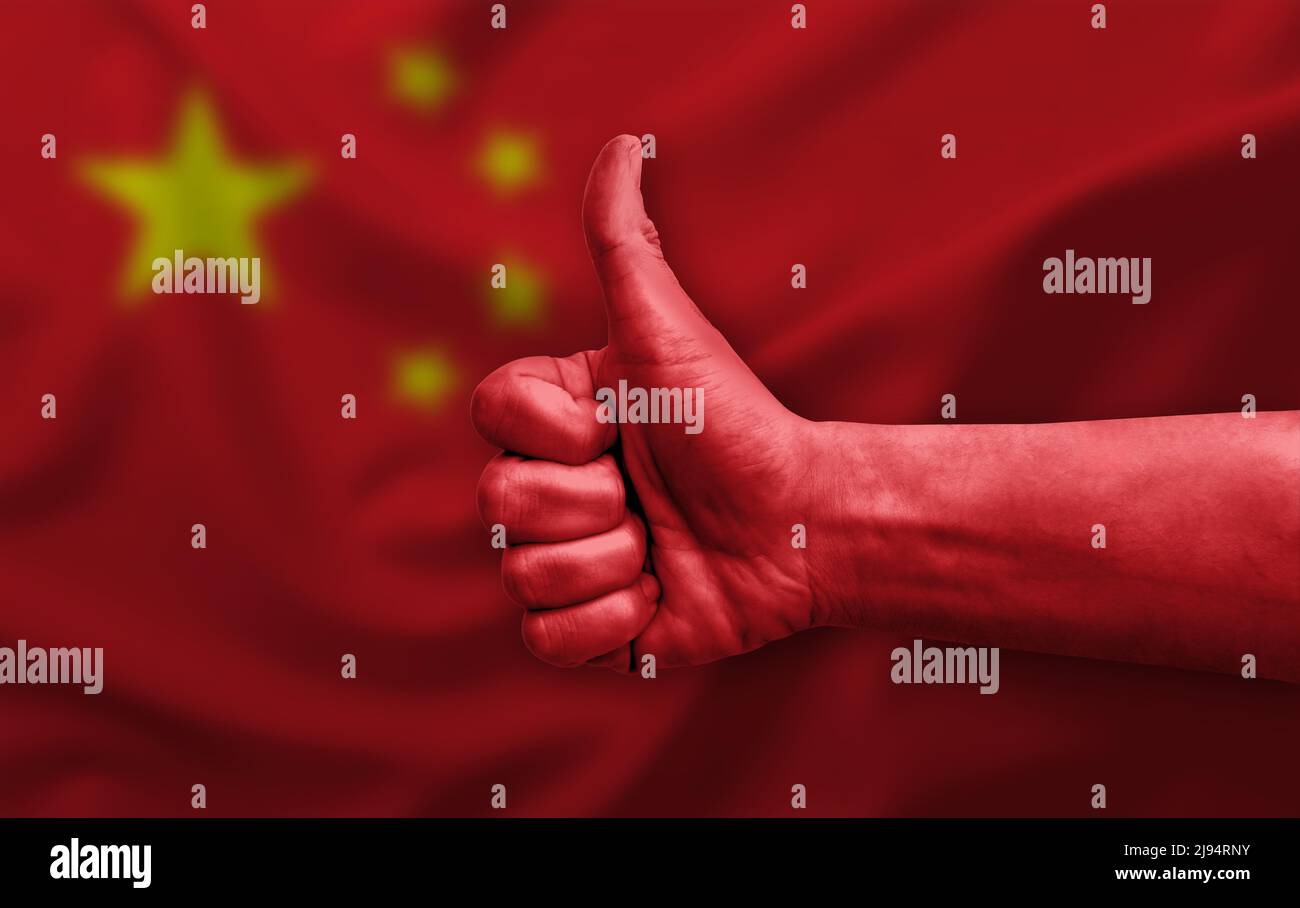 Hand making thumb up painted with flag of china Stock Photo - Alamy