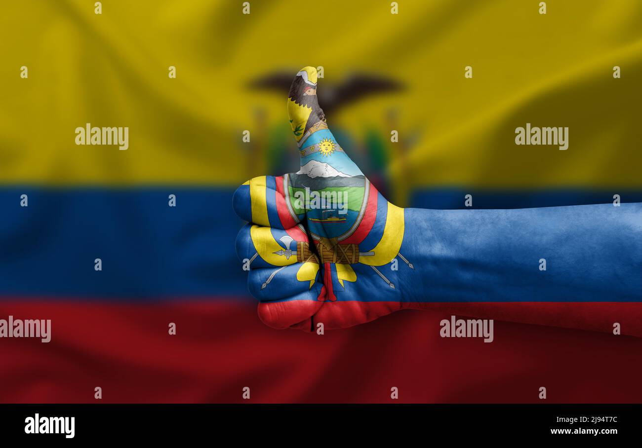 Hand making thumb up painted with flag of ecuador Stock Photo - Alamy