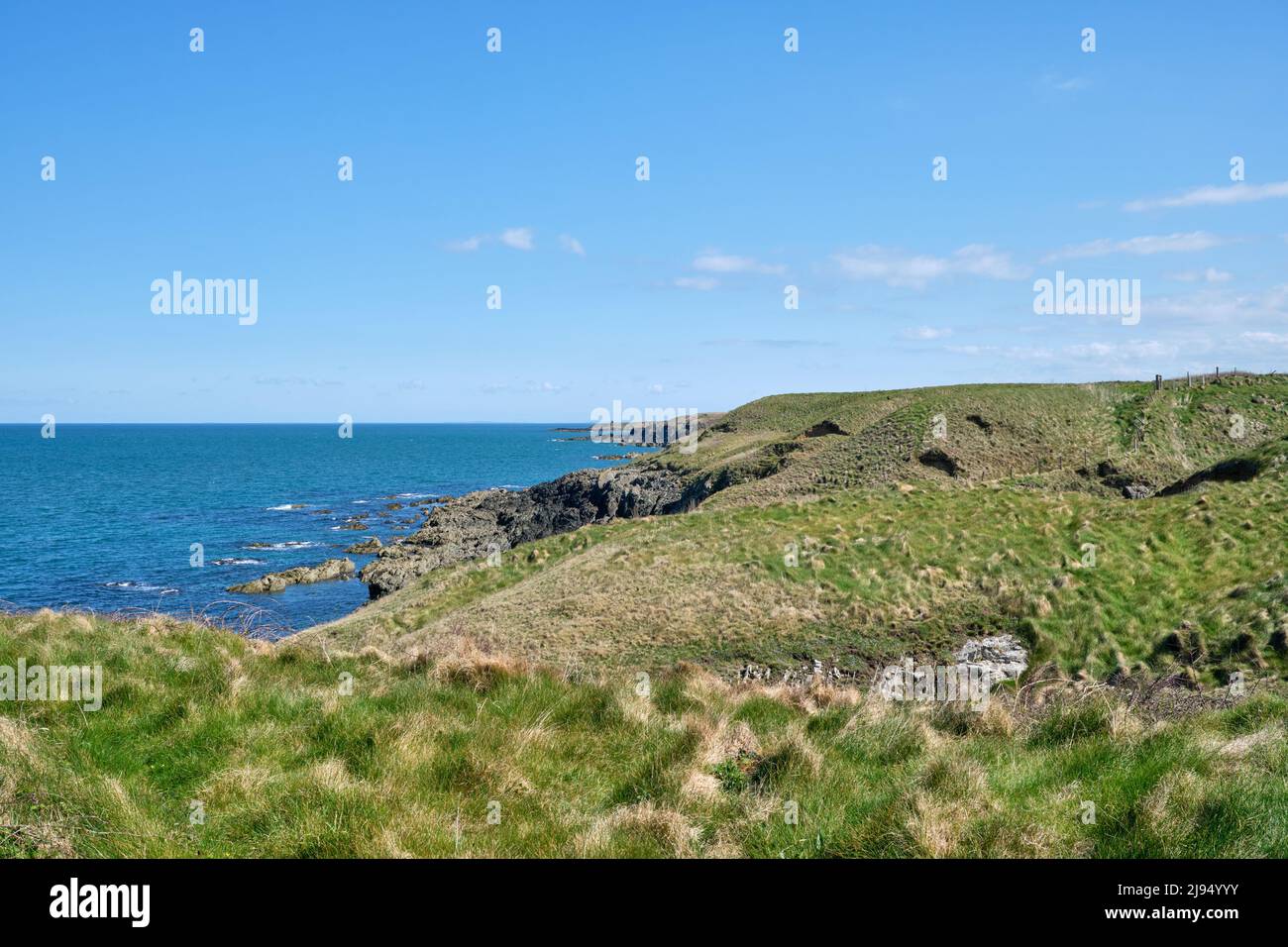 The Wales Coast Path follows the rugged coastline of the northern Llyn Peninsula Stock Photo