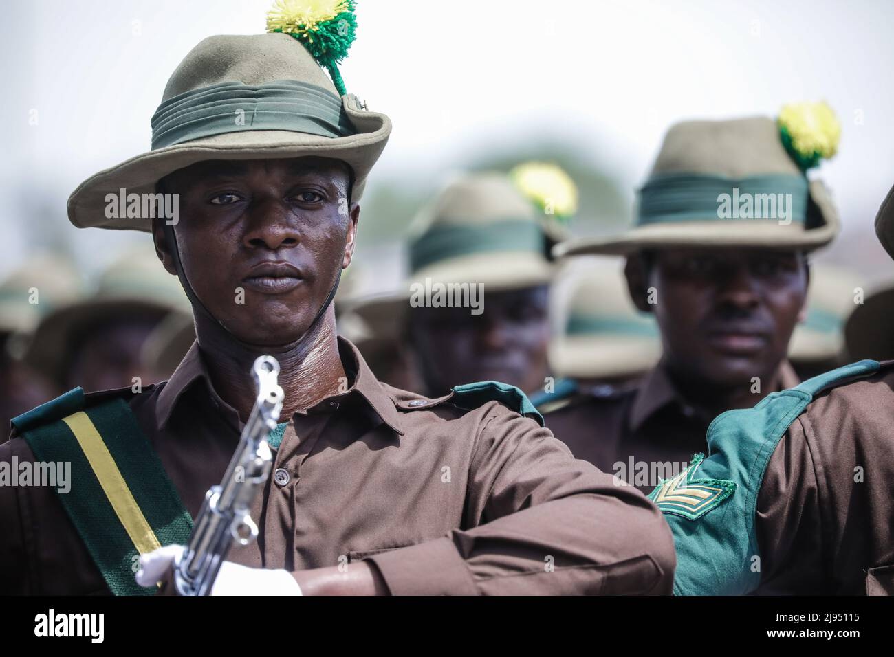 Tanzanias prison officers attend the parade during the 60th anniversary of independence day ceremony at the Uhuru Stadium in Dar es Salaam, Tanzania Stock Photo