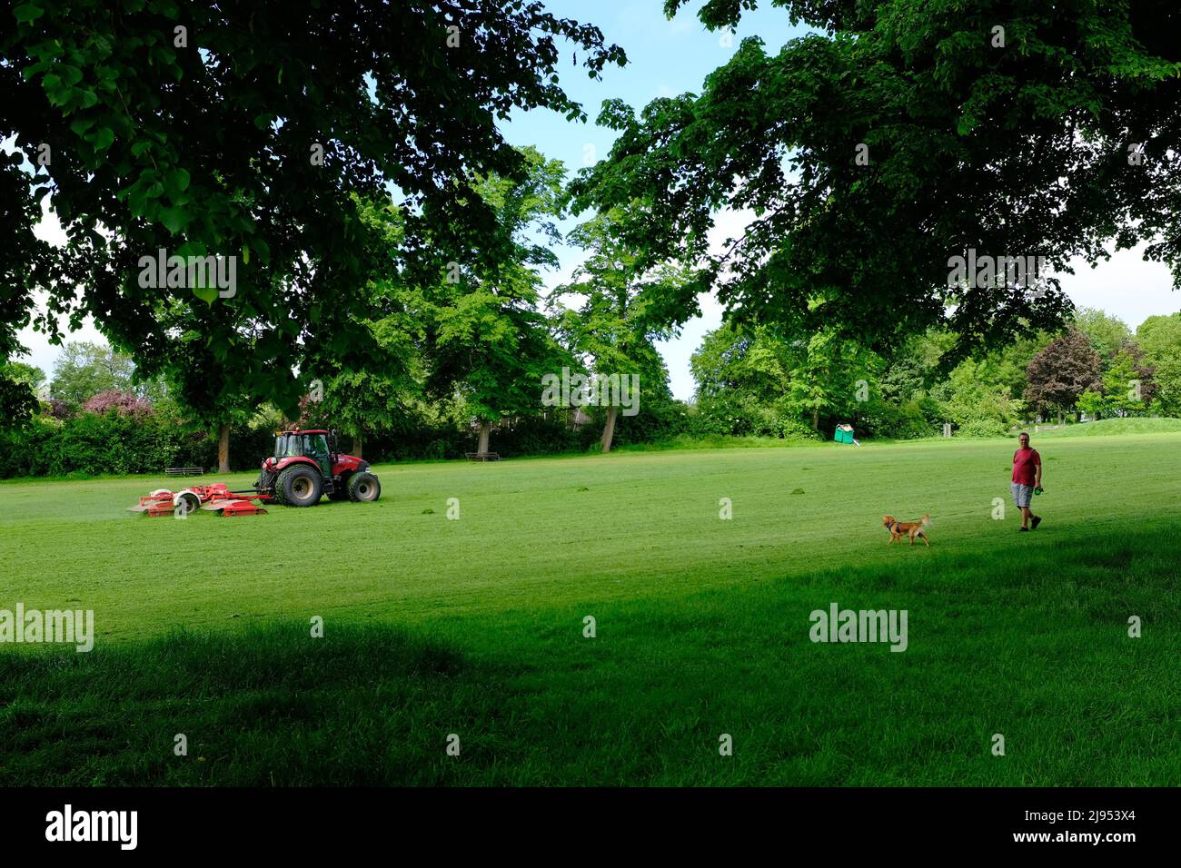 A council lawnmower cutting the grass in a Bristol park. Stock Photo