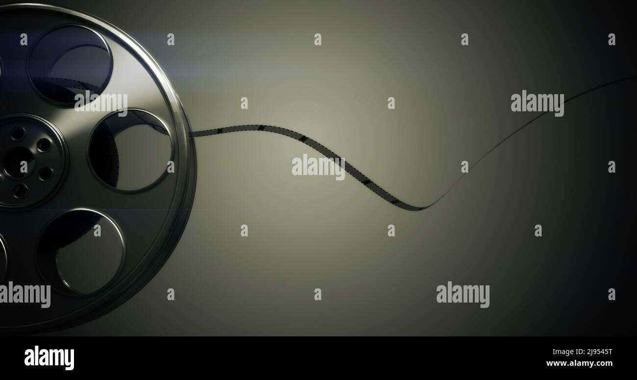 Film rolling out of a film reel Stock Photo Alamy