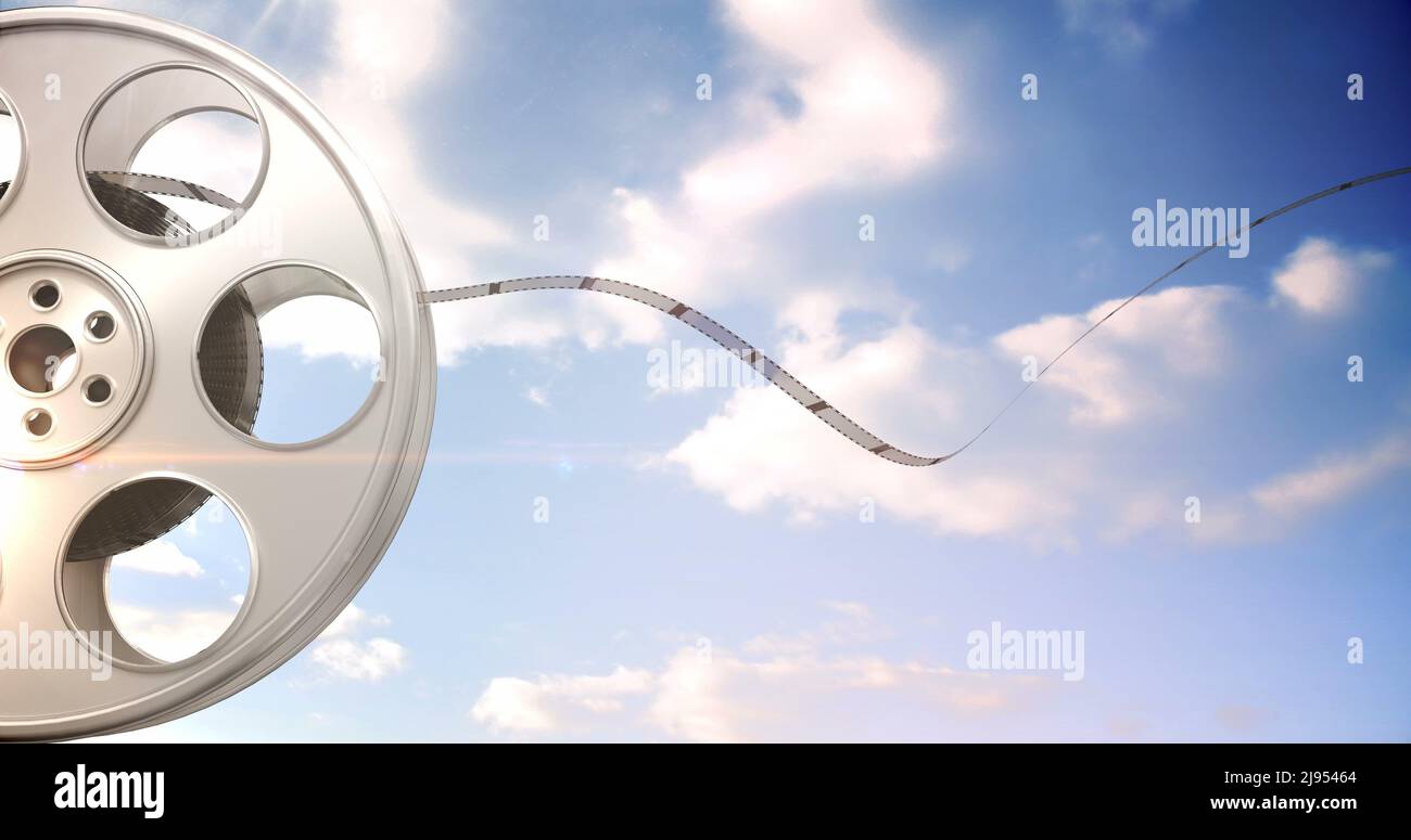 Film rolling out of a film reel Stock Photo Alamy