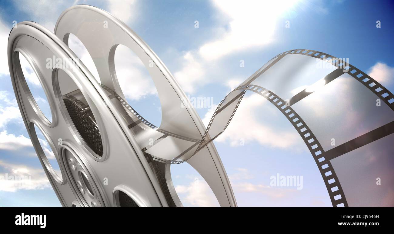 Film rolling out of a film reel Stock Photo Alamy
