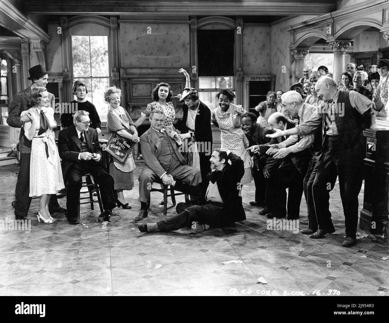 JAMES STEWART, JEAN ARTHUR, DUB TAYLOR, LIONEL BARRYMORE, SPRING BYINGTON, EDWARD ARNOLD, ANN MILLER, MARY FORBES, MISCHA AUER,  LILLIAN YARBO, EDDIE 'ROCHESTER' ANDERSON, DONALD MEEK, SAMUEL S. HINDS and HALLIWELL HOBBES in YOU CAN'T TAKE IT WITH YOU 1938 director FRANK CAPRA screenplay Robert Riskin based on the play by George S. Kaufman and Moss Hart music Dimitri Tiomkin Columbia Pictures Stock Photo