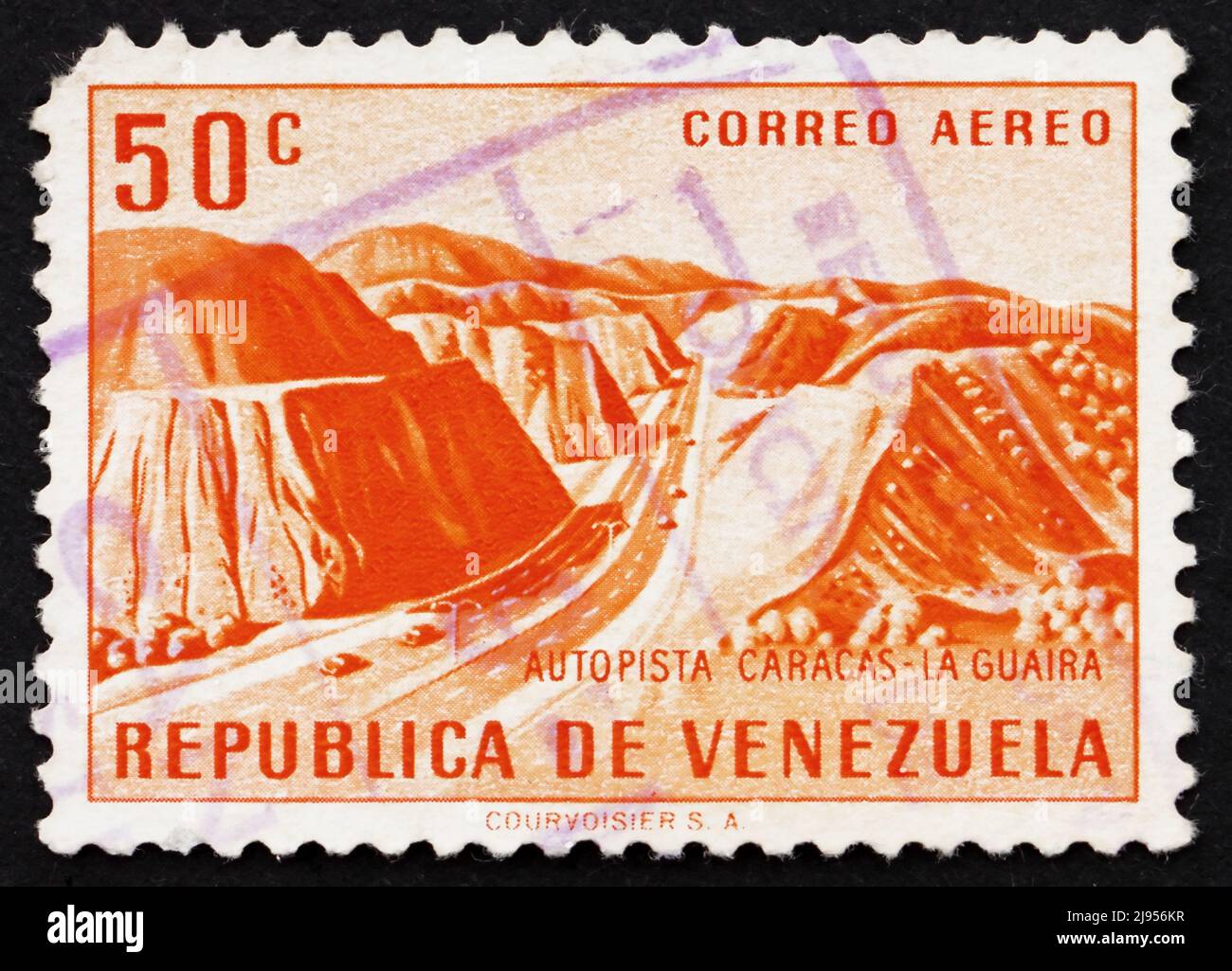 VENEZUELA - CIRCA 1956: a stamp printed in the Venezuela shows Caracas – La Guaira Highway, circa 1956 Stock Photo