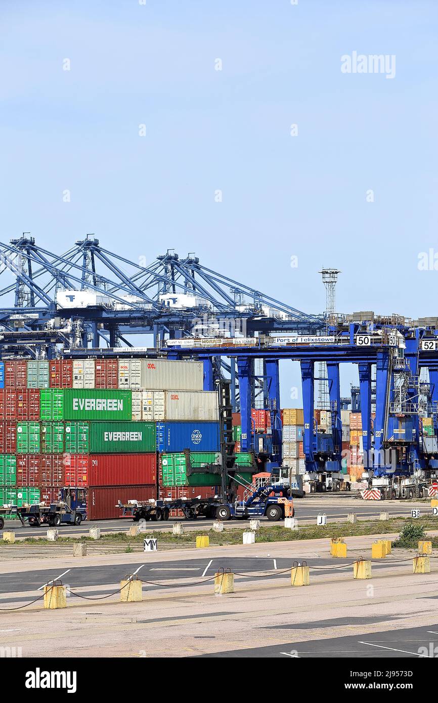 Container handler moving/loading containers in dockside container yard