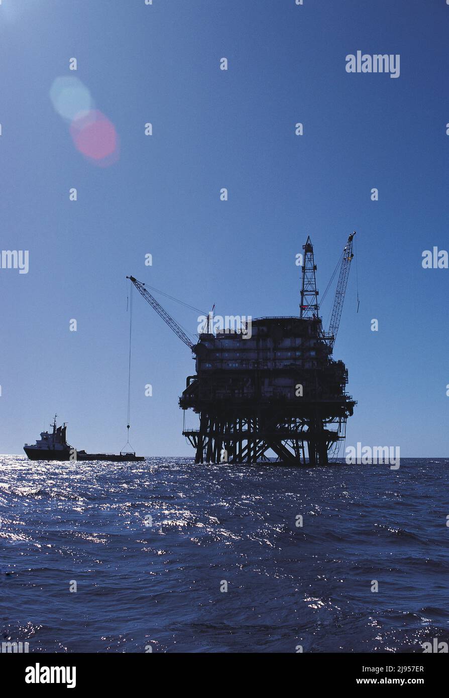 Australia. Western Australia. Offshore gas extraction platform. North Rankin A with supply ship. Stock Photo