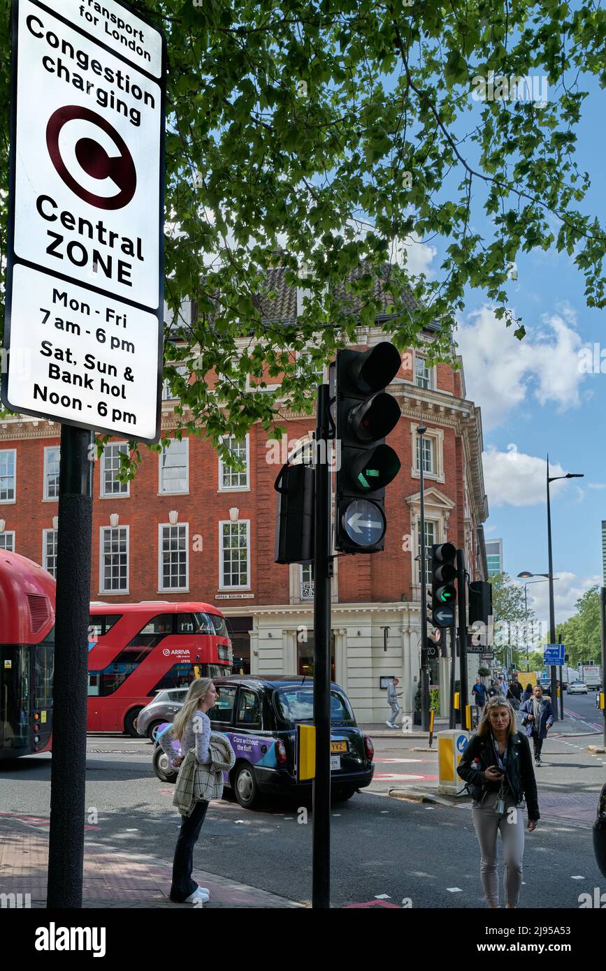 Notice about congestion charging in the central zone, Euston, London, England. Stock Photo