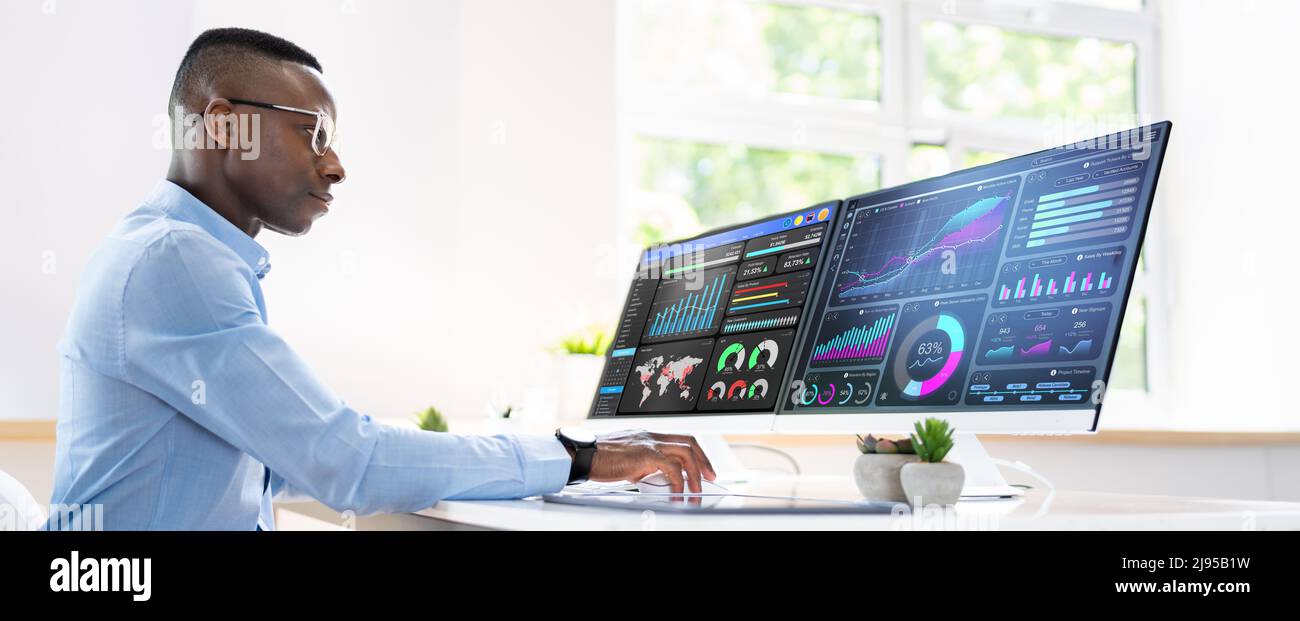 Analyst At Computer Predictive Business Analytics. African American Analyst Using Computer ...