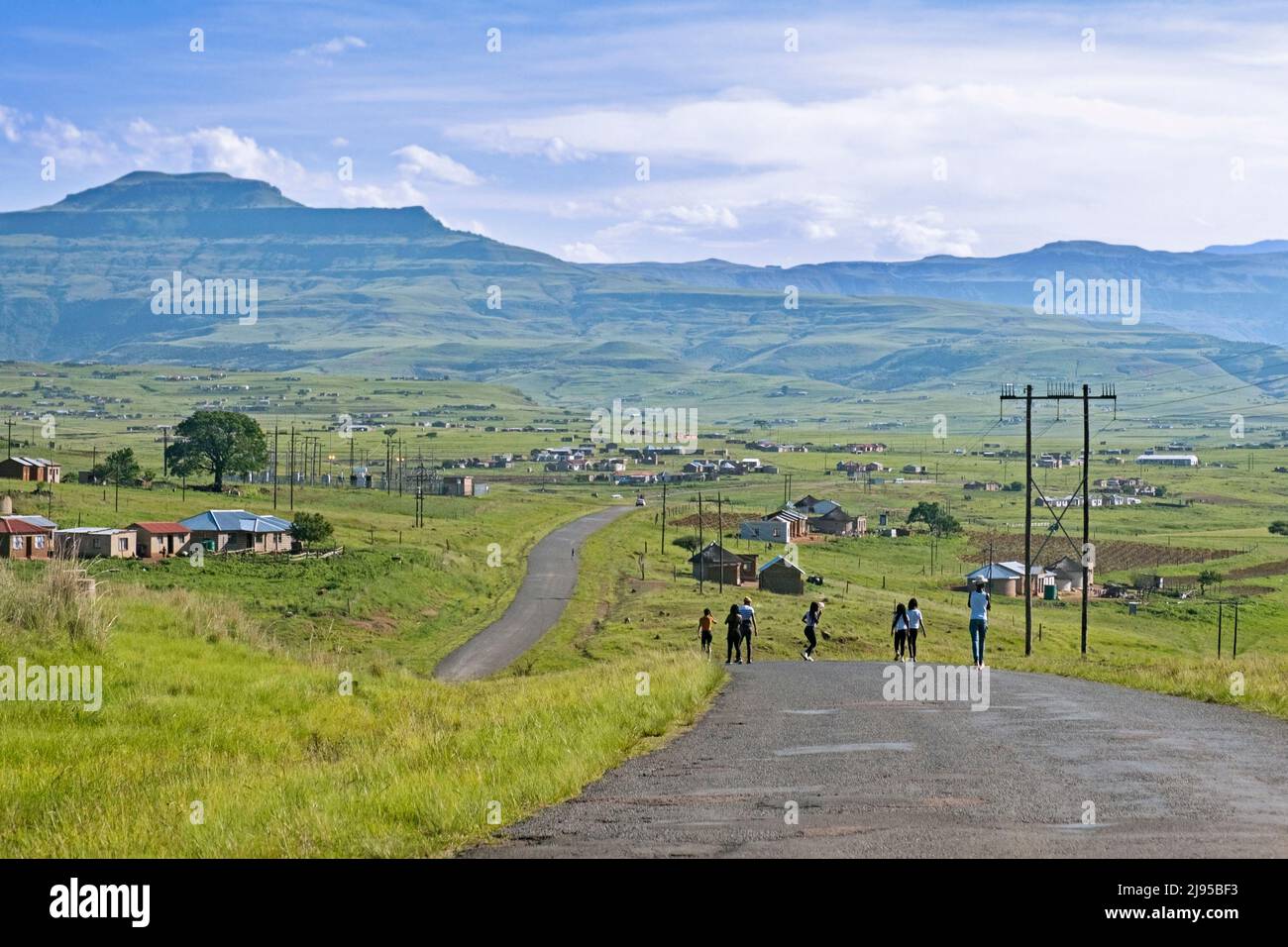 Drakensberg Mountain Range and rural settlement in the countryside of Injisuthi area in KwaZulu-Natal, South Africa Stock Photo