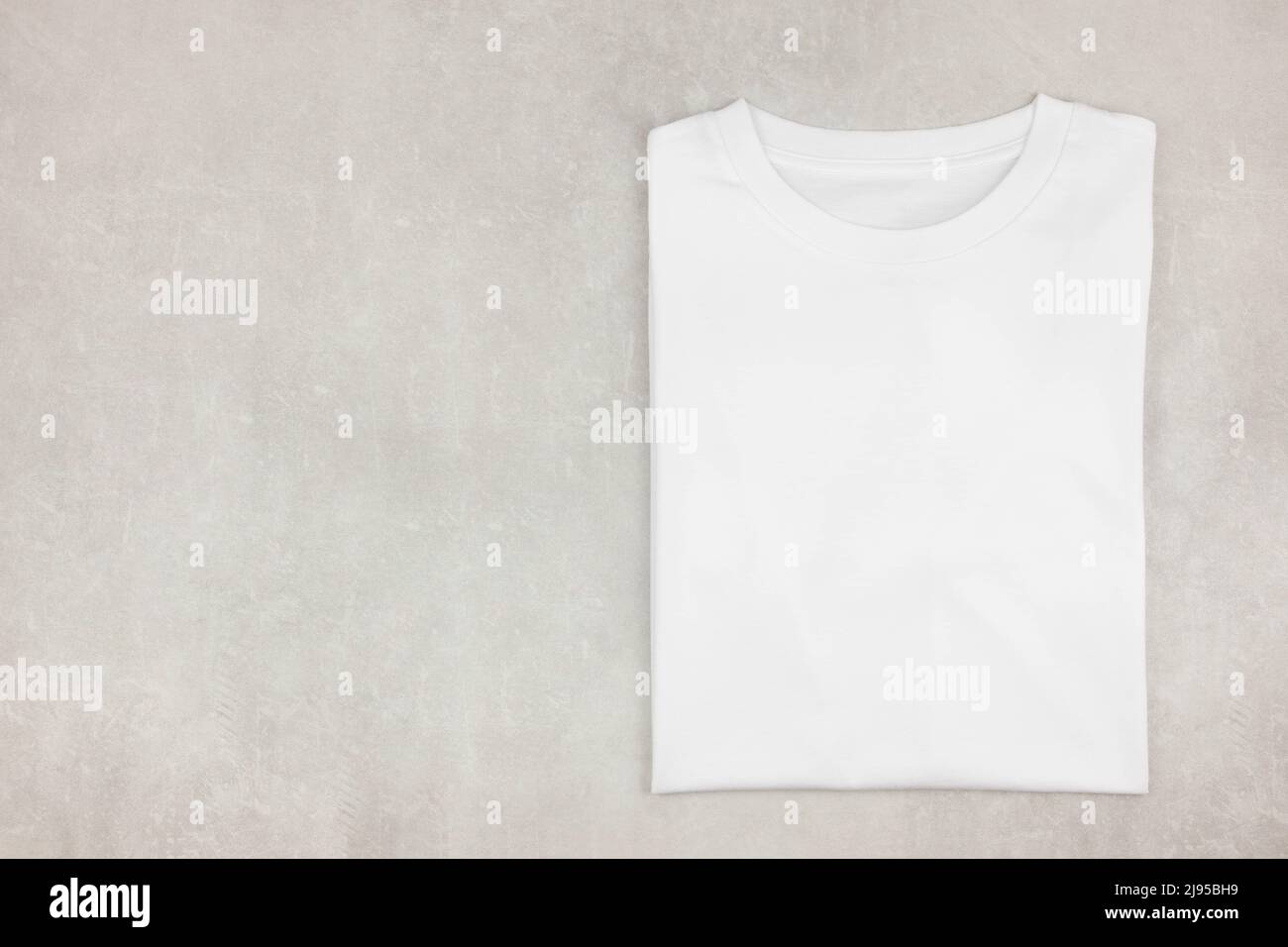 folded white t shirt