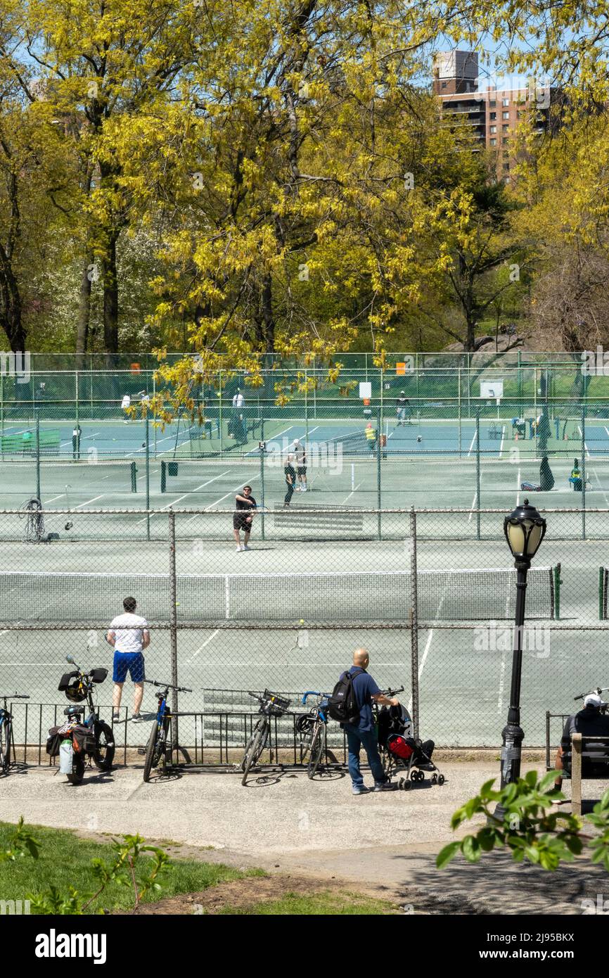 Players enjoying a spring afternoon at Central Park Tennis Center in