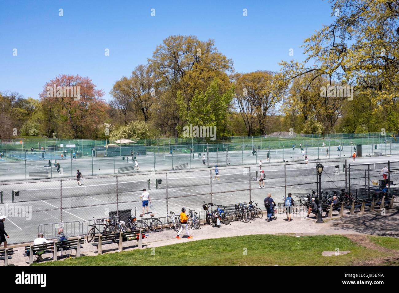 Players enjoying a spring afternoon at Central Park Tennis Center in