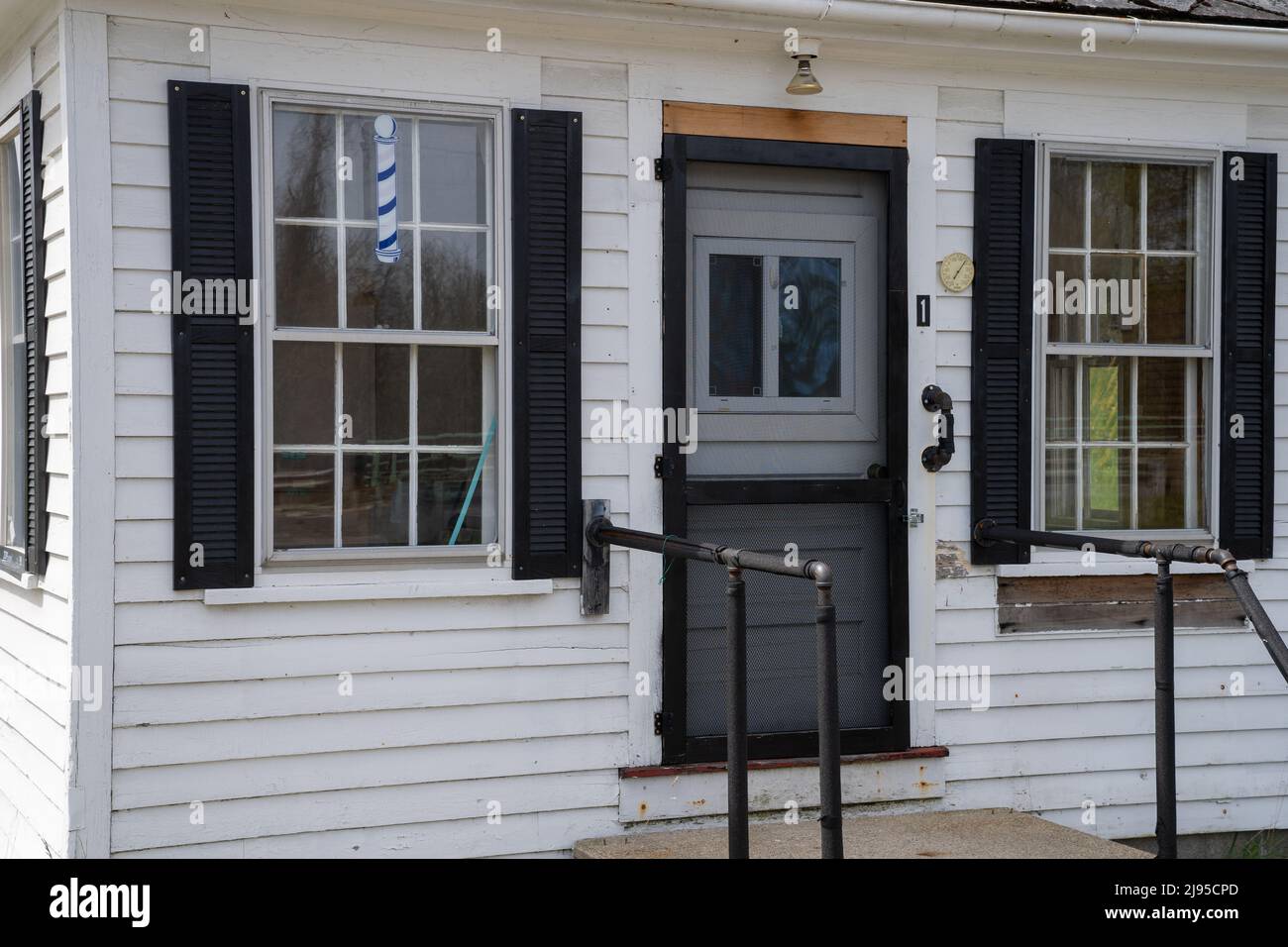 Bernardston, MA USA May 8, 2022 An abandoned barber shop on a