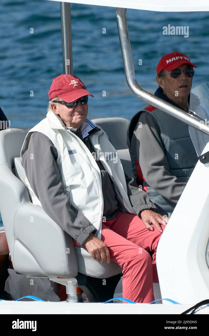 Sansenxo. Spain. 20220520,  King Juan Carlos of Spain on board of Cristina boat after the first day of third series of the Spanish 6 Metres Cup at Sanxenxo Royal Yacht Club on May 20, 2022 in Sansenxo, Spain   After nearly two years in exile in the United Arab Emirates following a string of financial scandals, Spain's former king makes his first trip back in Spain, on a brief visit that has sparked widespread criticism.Sansenxo. Spain. 20220520,  King Juan Carlos of Spain attends third series of the Spanish 6 Metres Cup day 1 at Sanxenxo Royal Yacht Club on May 20, 2022 in Sansenxo, Spain   Af Stock Photo
