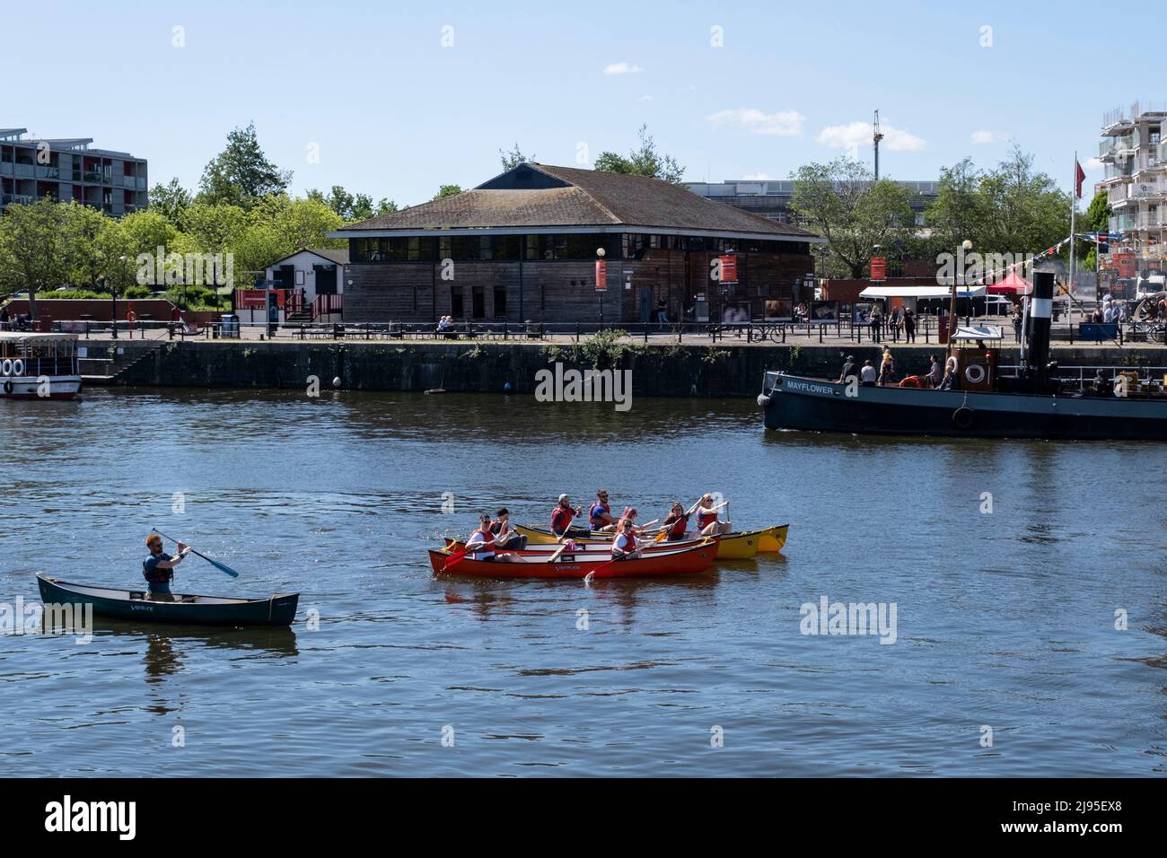 People canoeing in the Harbourside area on 7th May 2022 in Bristol, United Kingdom. Stock Photo