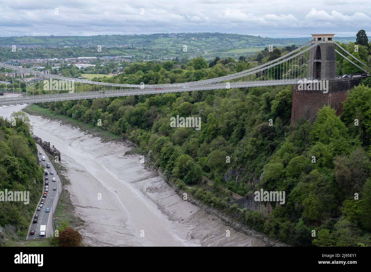 Clifton Suspension Bridge on 6th May 2022 in Bristol, United Kingdom. The Clifton Suspension Bridge is a suspension bridge spanning the Avon Gorge and the River Avon, linking Clifton in Bristol to Leigh Woods in North Somerset. Designed by Isambard Kingdom Brunel, it is a Grade I listed building and forms part of the B3129 road. Stock Photo