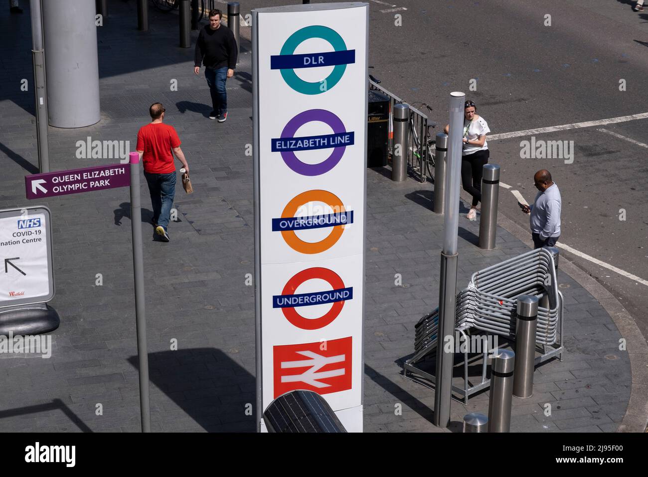 Sign outside Stratford station for the Elizabeth Line, DLR, Overground and London Underground on 18th May 2022 in London, United Kingdom. The Elizabeth line is to run services on Crossrail in Central London and to the west along the Great Western Main Line; and east along the Great Eastern Main Line. The the line will open to the public on 24th May 2022. The project has been subject to long delays, originally supposed to open in December 2018, and is vastly over budget by £4bn. Stock Photo