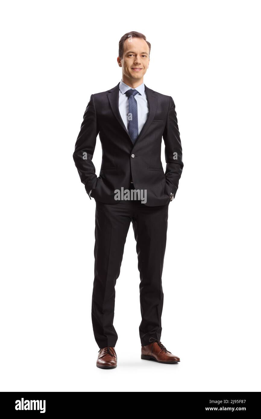 Full length portrait of a businessman posing and looking at camera ...