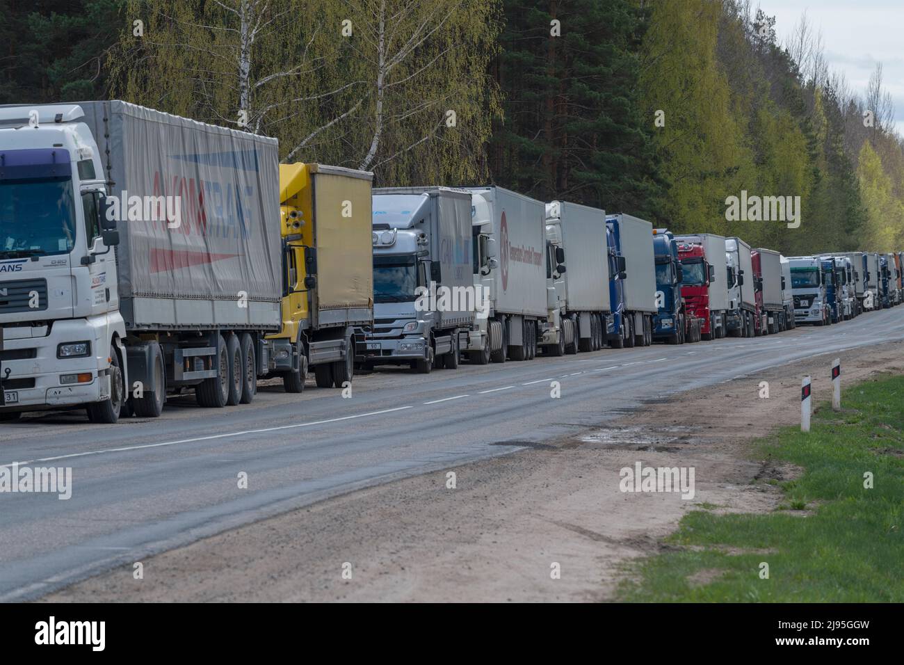 PSKOV REGION, RUSSIA - MAY 08, 2022: Queue of European trucks at the Russian-Estonian border Stock Photo