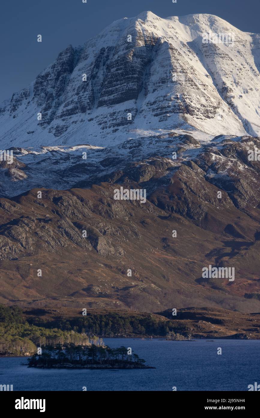 Slioch towering over Loch Maree in winter, Wester Ross, Scotland, UK Stock Photo