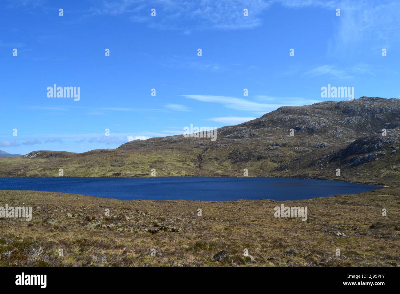 Loch na Gainmhich, Sutherland and Assynt. Scotland. Path to UK's highest waterfall starts next to this lake. Stock Photo