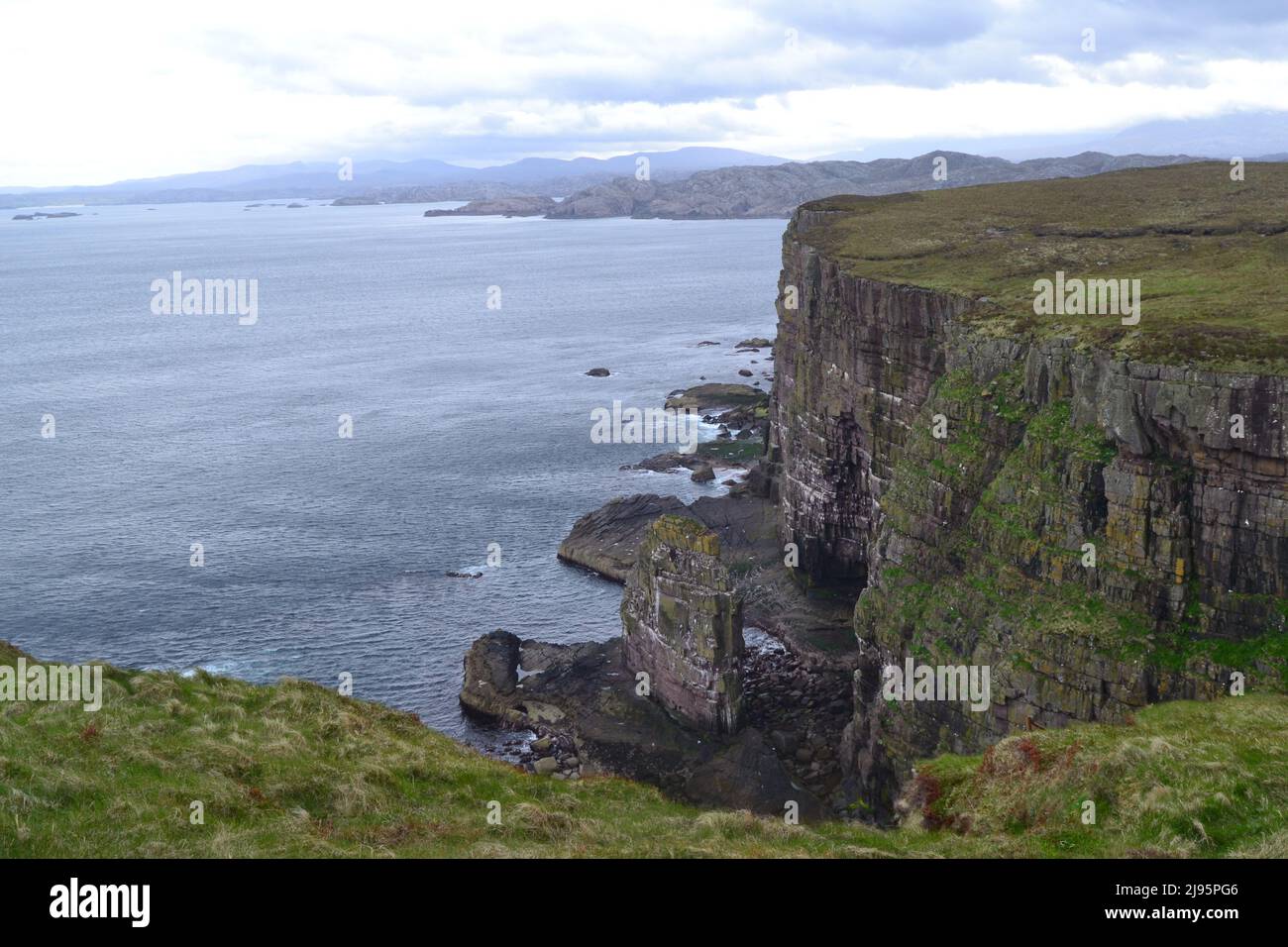Handa Island, Sutherland, sea cliffs of Torridonian sandstone, home to auks, puffins, fulmars. Scottish Wildlife Trust. Sea stacks, far north UK Stock Photo