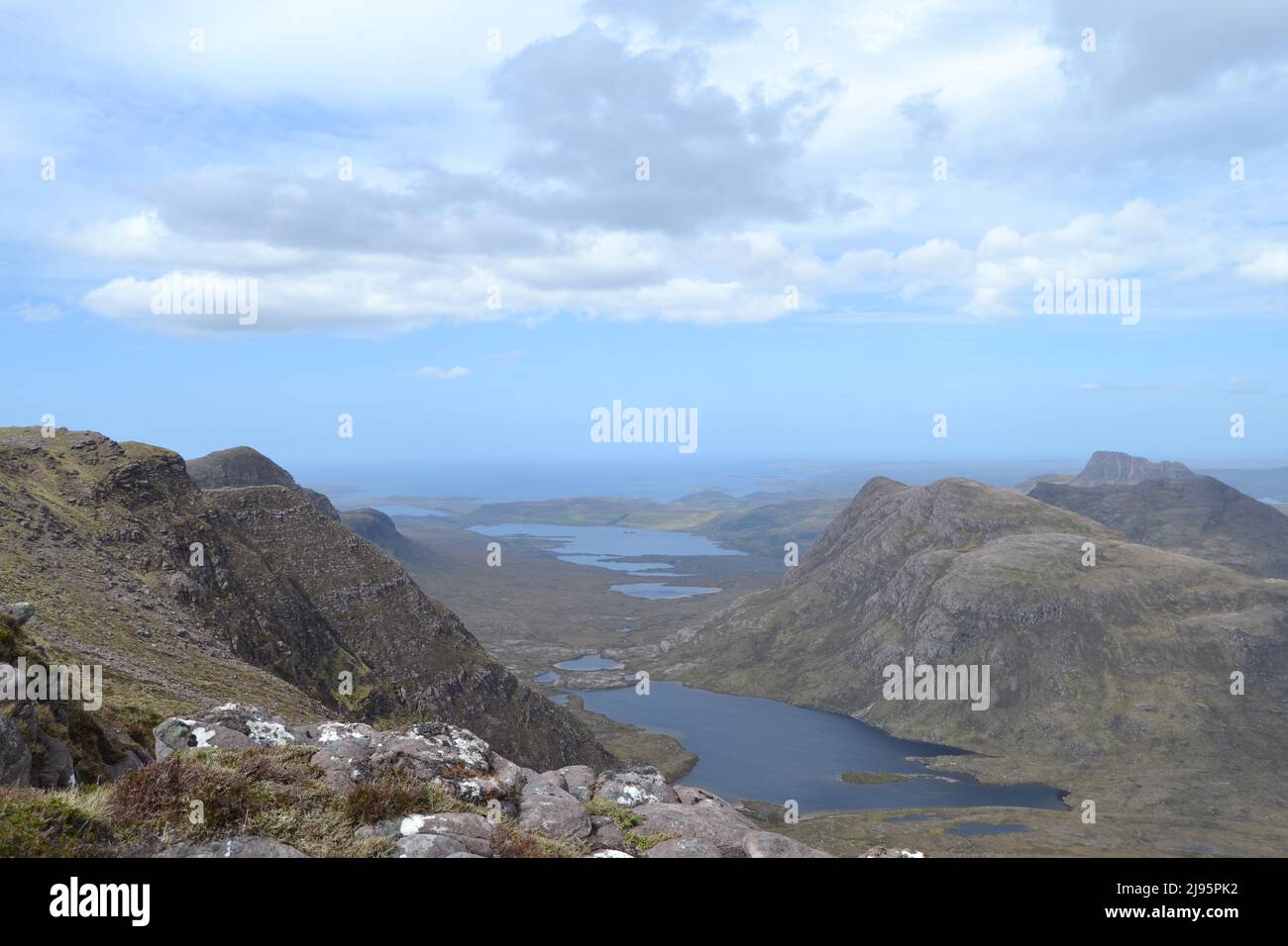 Ben Mor Coigach, an fab ridge near Ullapool, hikers, walkers, views of Summer Isles and Suilven mountain, Stac Poilaidh and Cul Mor views Sandstone Stock Photo
