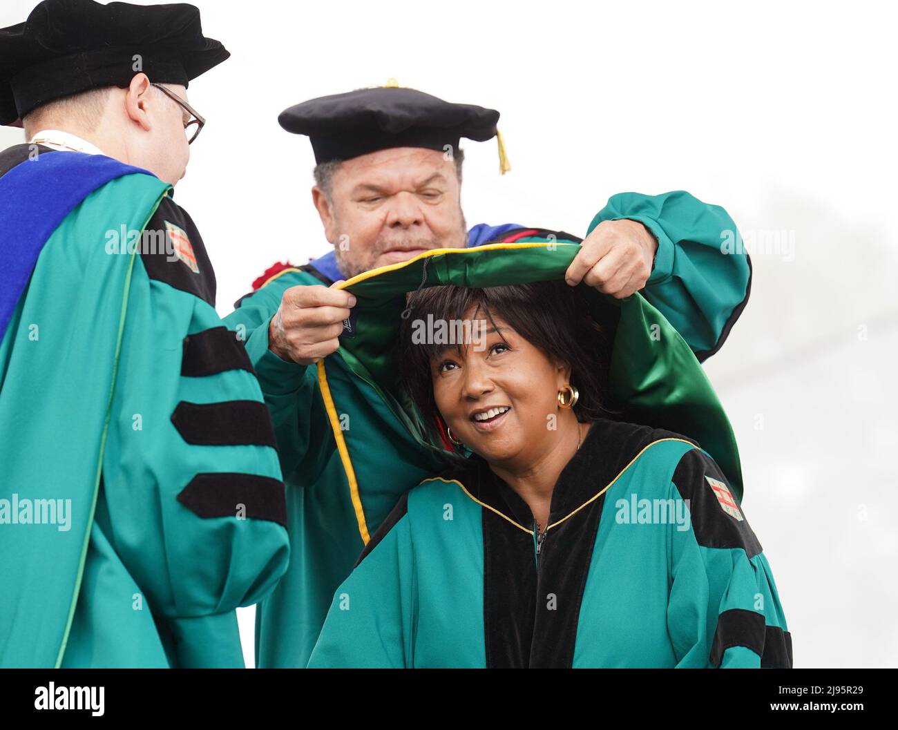 St. Louis, USA. 20th May, 2022. Mae C. Jemison, is hooded, receiving an honorary degree after delivering the commencement speech to the Washington University graduating class of 2021-2022 in St. Louis on Friday, May 20, 2022. As a NASA astronaut aboard the space shuttle Endeavour in 1992, Jemison became the first woman of color to travel into space. Photo by Bill Greenblatt/UPI Credit: UPI/Alamy Live News Stock Photo