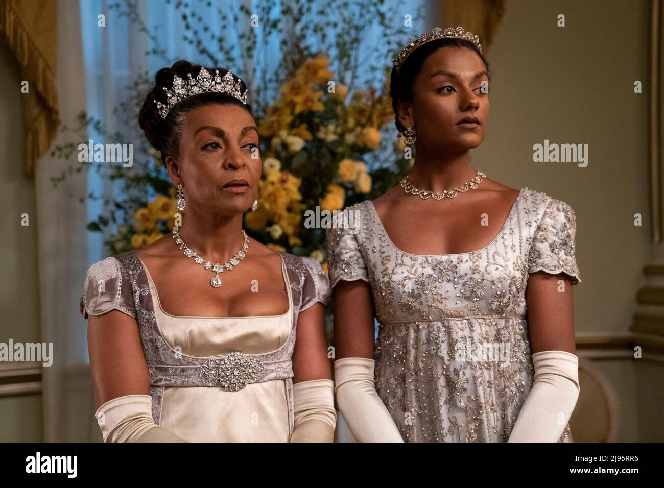 Bridgerton. (L to R) Adjoa Andoh as Lady Danbury, Simone Ashley as Kate Sharma in episode 201 Stock Photo