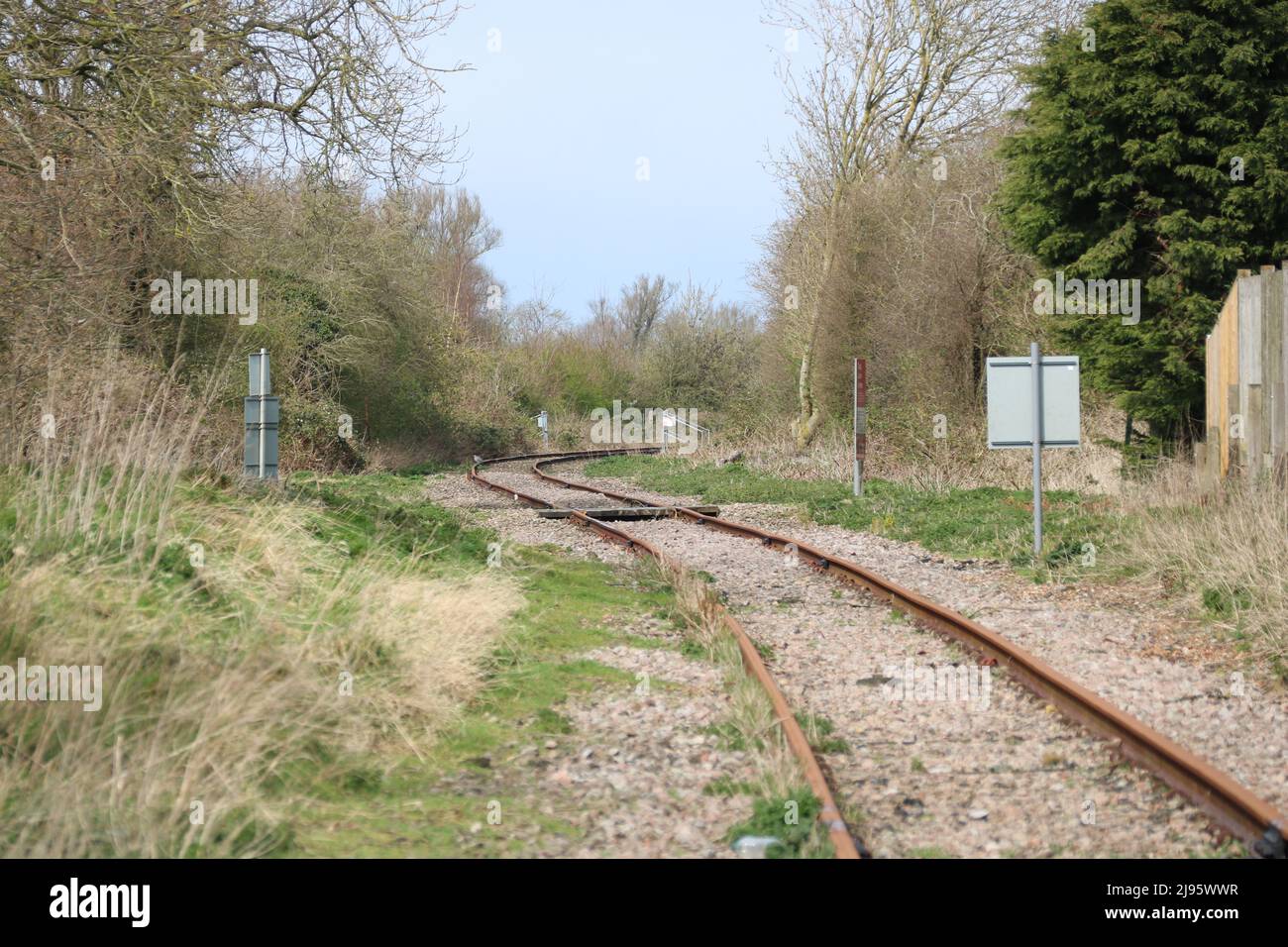 A curved single track railway branch line in the United Kingdom with