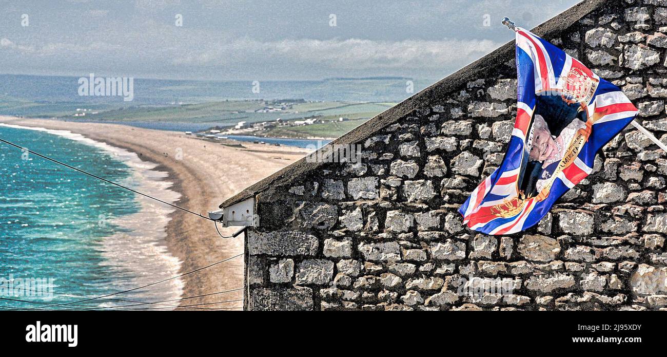 Chesil Beach. 20th May 2022. UK Weather. Platinum Jubilee flag flutters