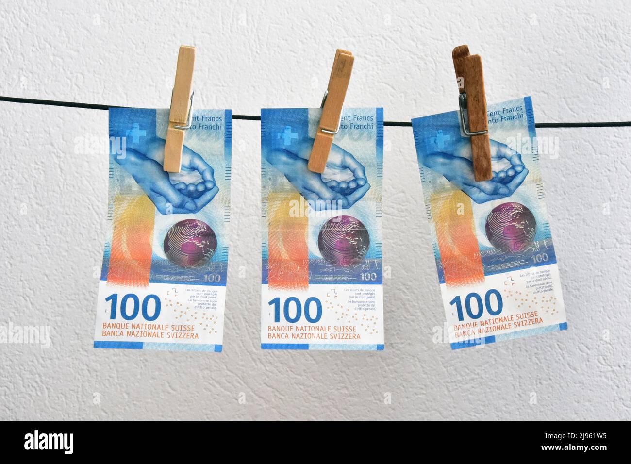 swiss haning money 100 franc banknote Stock Photo