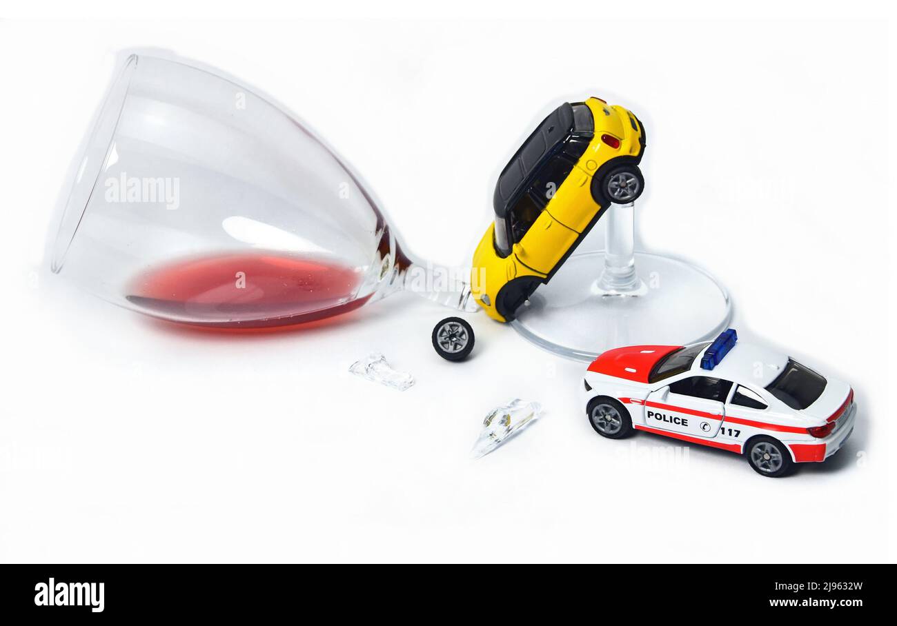 funny drinking and driving accident with toy cars Stock Photo