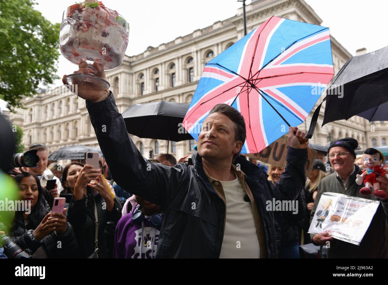 TV Chef JAMIE OLIVER protested in front of Downing Street, against government dropping an almost-implemented Obesity Law, which details banning deal promotions for unhealthy and junk foods,  as well as limiting their TV advertisements. The protest's name, 'Eton Mess', references a dessert believed to have originated from Boris Johnson's place of education, Eton College. Stock Photo
