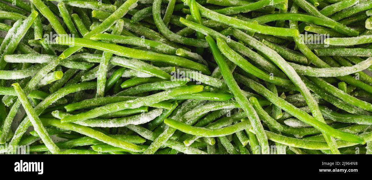 Frozen green beans, haricots verts, close up, flat lay. Fresh raw