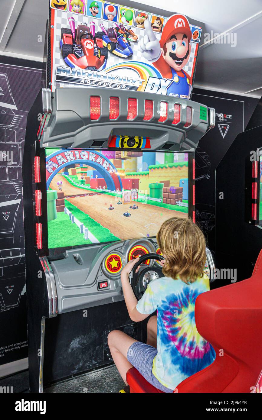 Miami Beach Florida,FTX Off the Grid free event,Race Weekend Grand Prix Formula One 1 F1 racing event,boy playing operating driving video game,Mario K Stock Photo